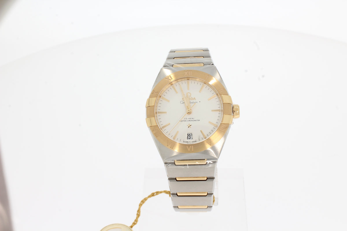 Omega CONSTELLATION CO‑AXIAL MASTER CHRONOMETER 36mm 131.20.36.20.02.002 silver, steel ‑ yellow gold with steel and yellow gold strap