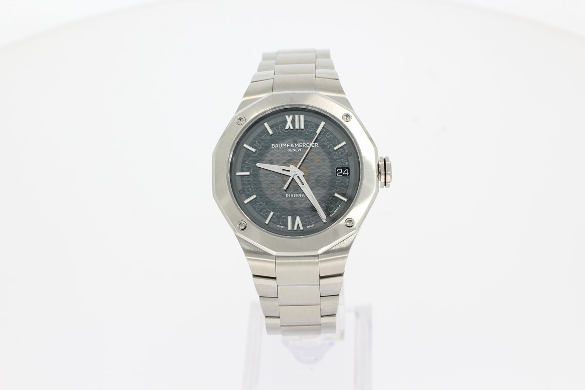 Baume & Mercier Riviera 10715 Automatik, 39mm Stahl Zwölfeckig, rauchgraues Saphirzifferblatt, Kalenderöffnung, Minuten, Zentrale Sekunde, Stunden,M0A10715