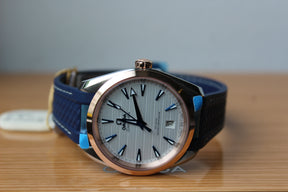 Omega Seamaster AQUA TERRA 150 M CO‑AXIAL MASTER CHRONOMETER 220.22.38.20.02.001 argent 38 mm or/acier, bracelet en caoutchouc bleu