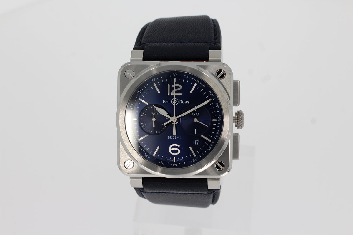 Montre homme Bell &amp; Ross BR 03-94 Chronographe BR0394-BLU-ST/SCA 42 mm en acier, mouvement mécanique, cuir de veau bleu et tissu synthétique noir.