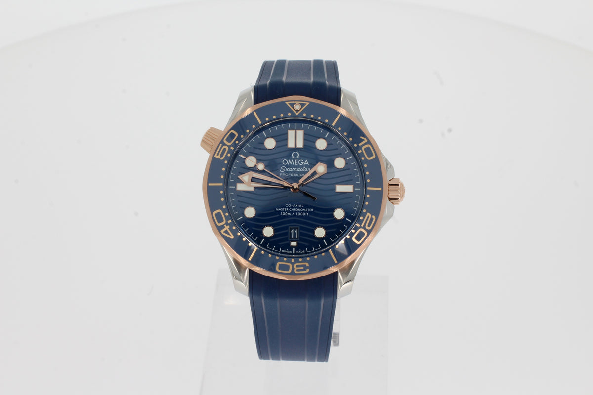 Omega Seamaster Diver 300M Co‑Axial Master Chronometer 210.22.42.20.03.002 blue 42mm gold/steel, blue rubber strap